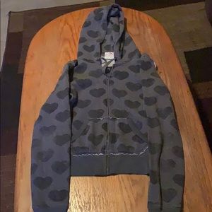 Grey with black hearts zip up hoodie.